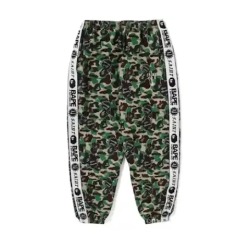 green-bape-x-saint-mx-camo-track-pants.webp Green BAPE x Saint Mx Camo Track Pants - Image 1